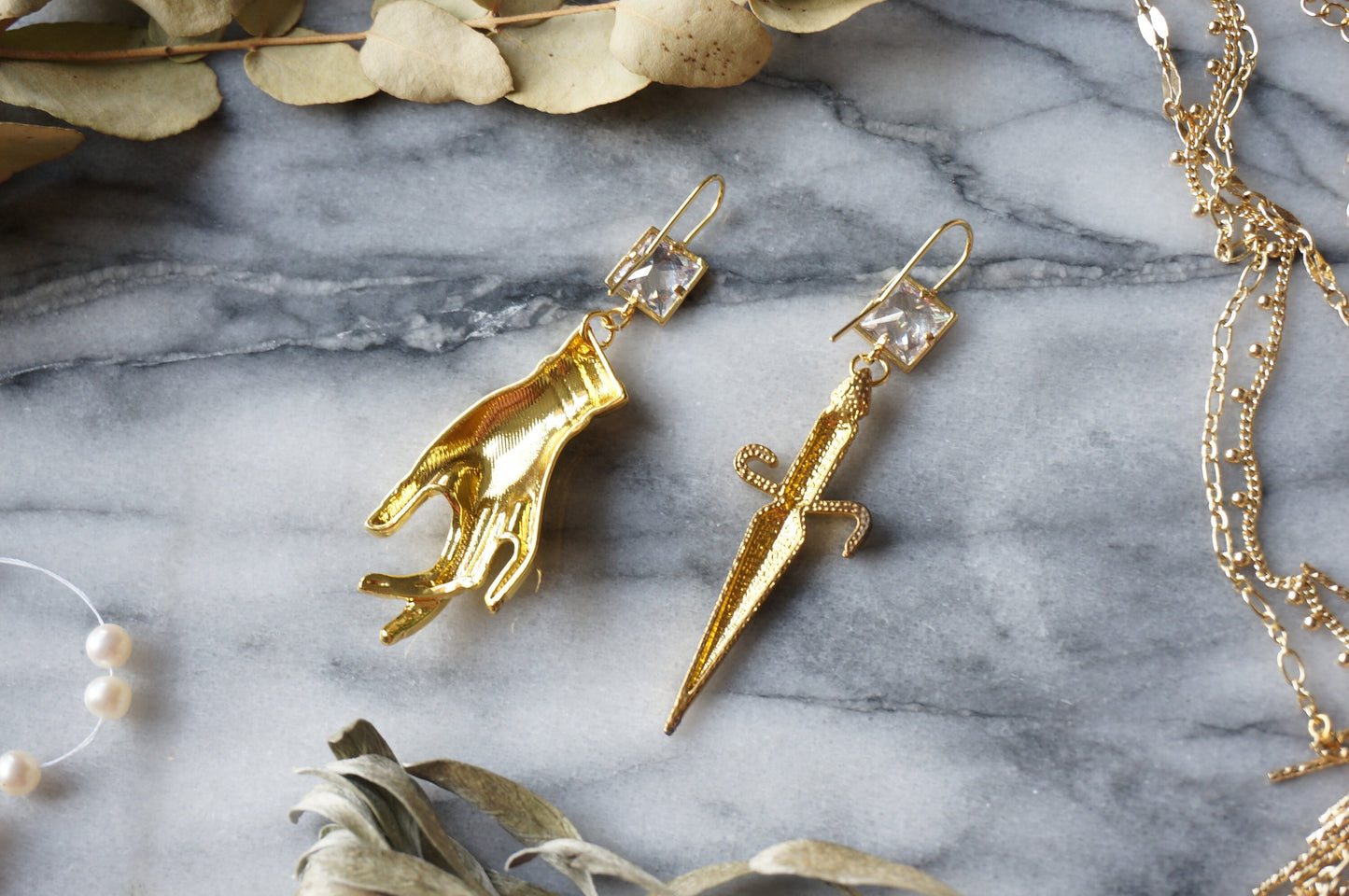 Gold Dagger and Tarot Hand Mismatched Crystal Earrings