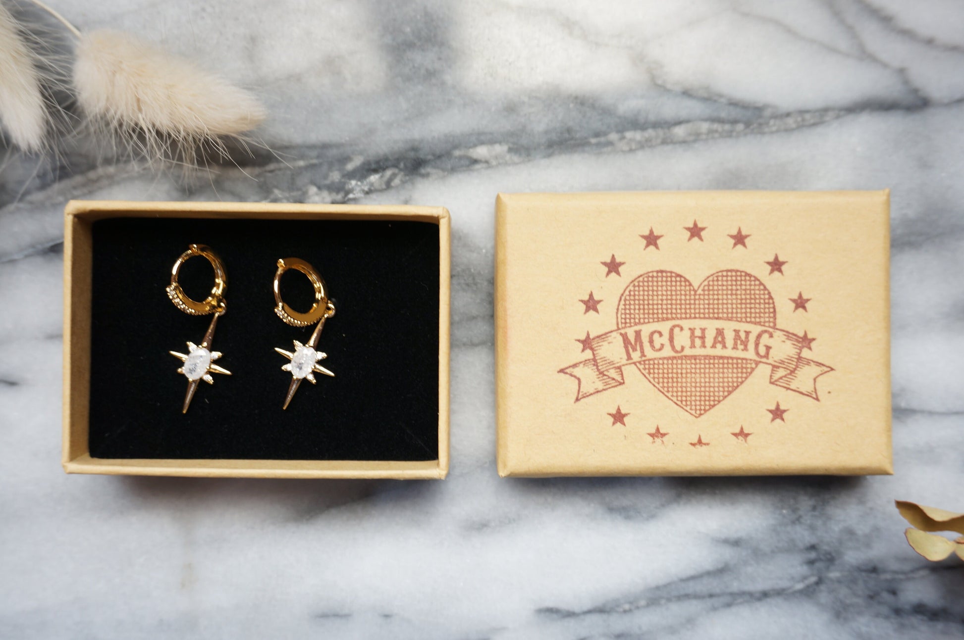 SELESTE North Star Opalite Huggie Hoop Earrings in Gold / Silver