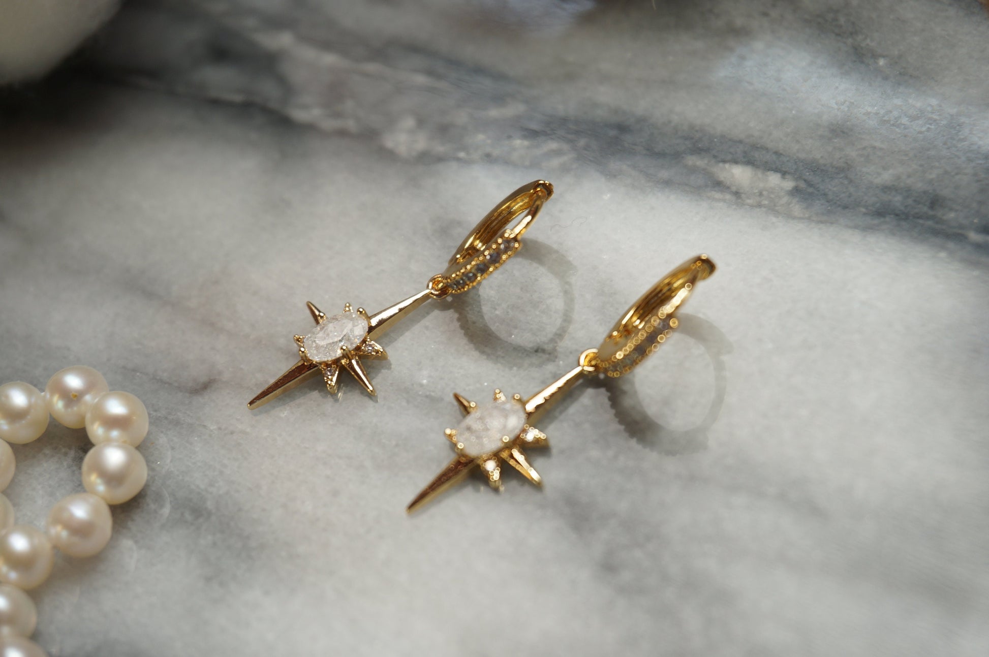 SELESTE North Star Opalite Huggie Hoop Earrings in Gold / Silver