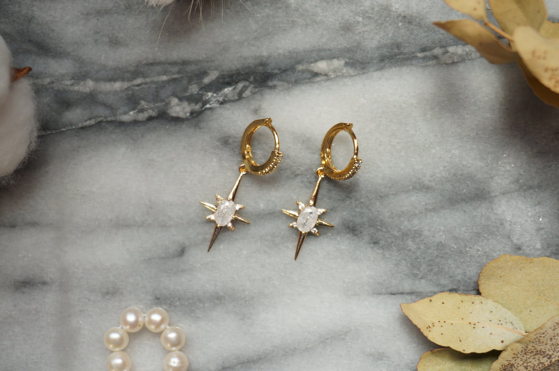 SELESTE North Star Opalite Huggie Hoop Earrings in Gold / Silver