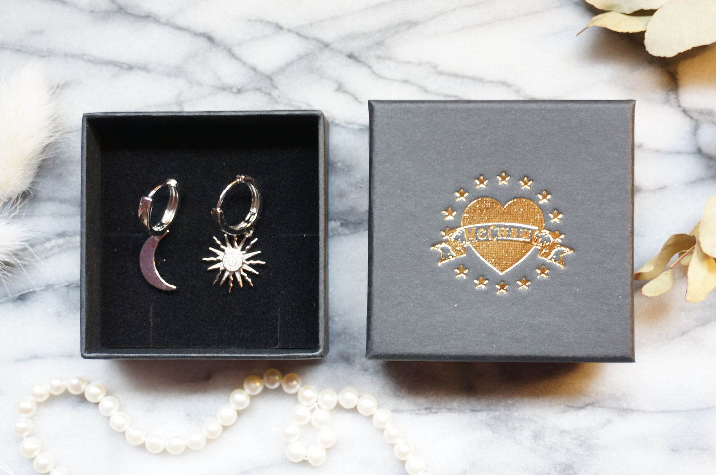 SOLSTICE Sun and Moon Mismatched Thick Gold Huggie Hoop Earrings in Gold/Silver
