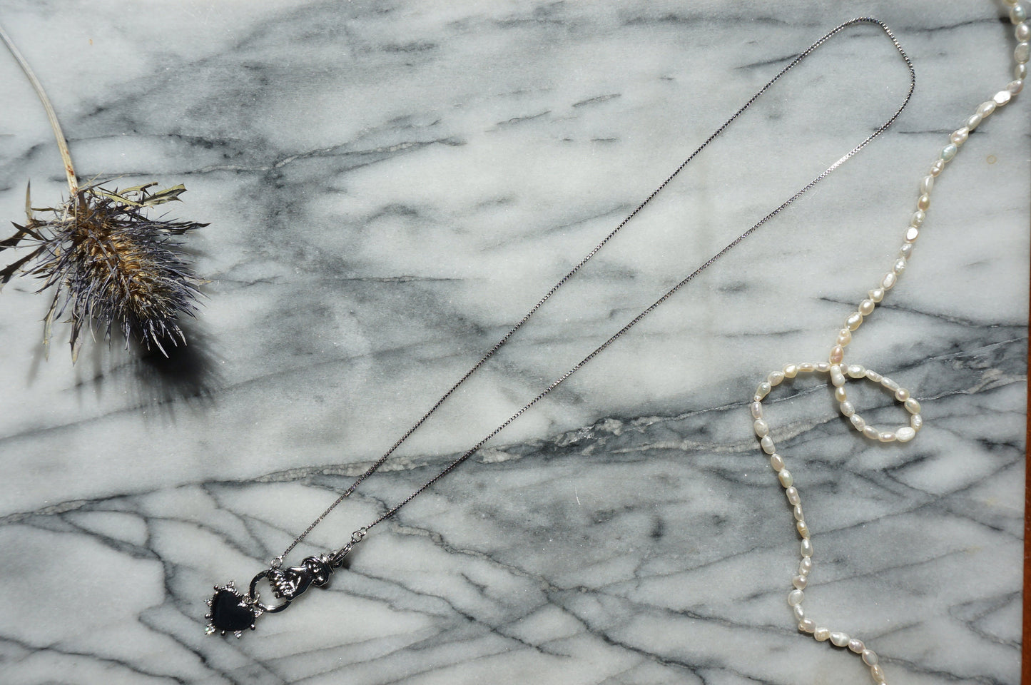 Hand holding Heart Gold / Silver Necklace