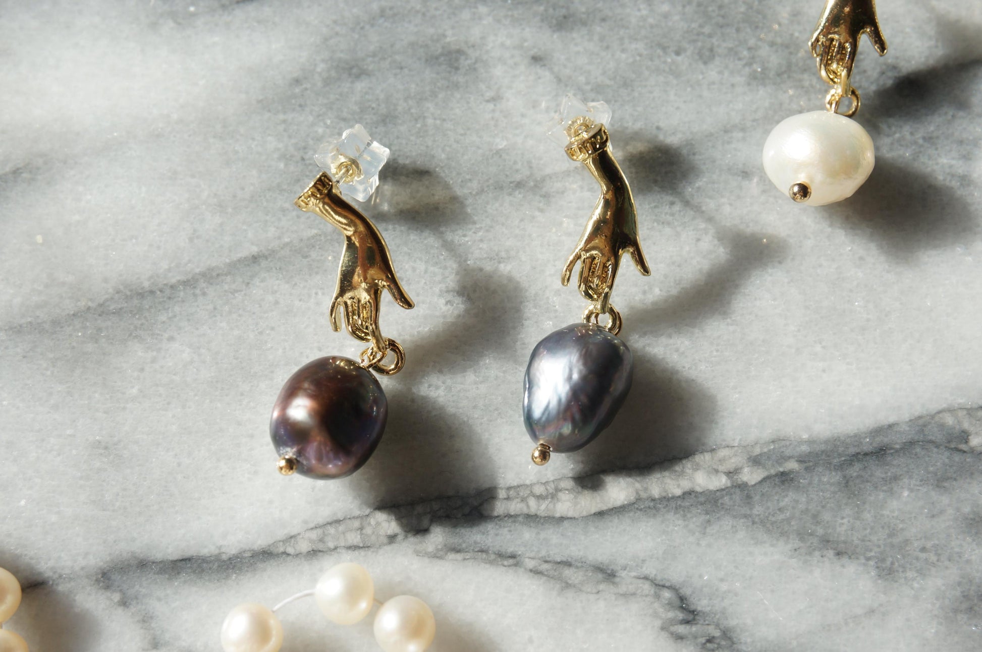 HAND HOLDING baroque Pearl 18k gold plated STUD earrings / white and black pearl earrings