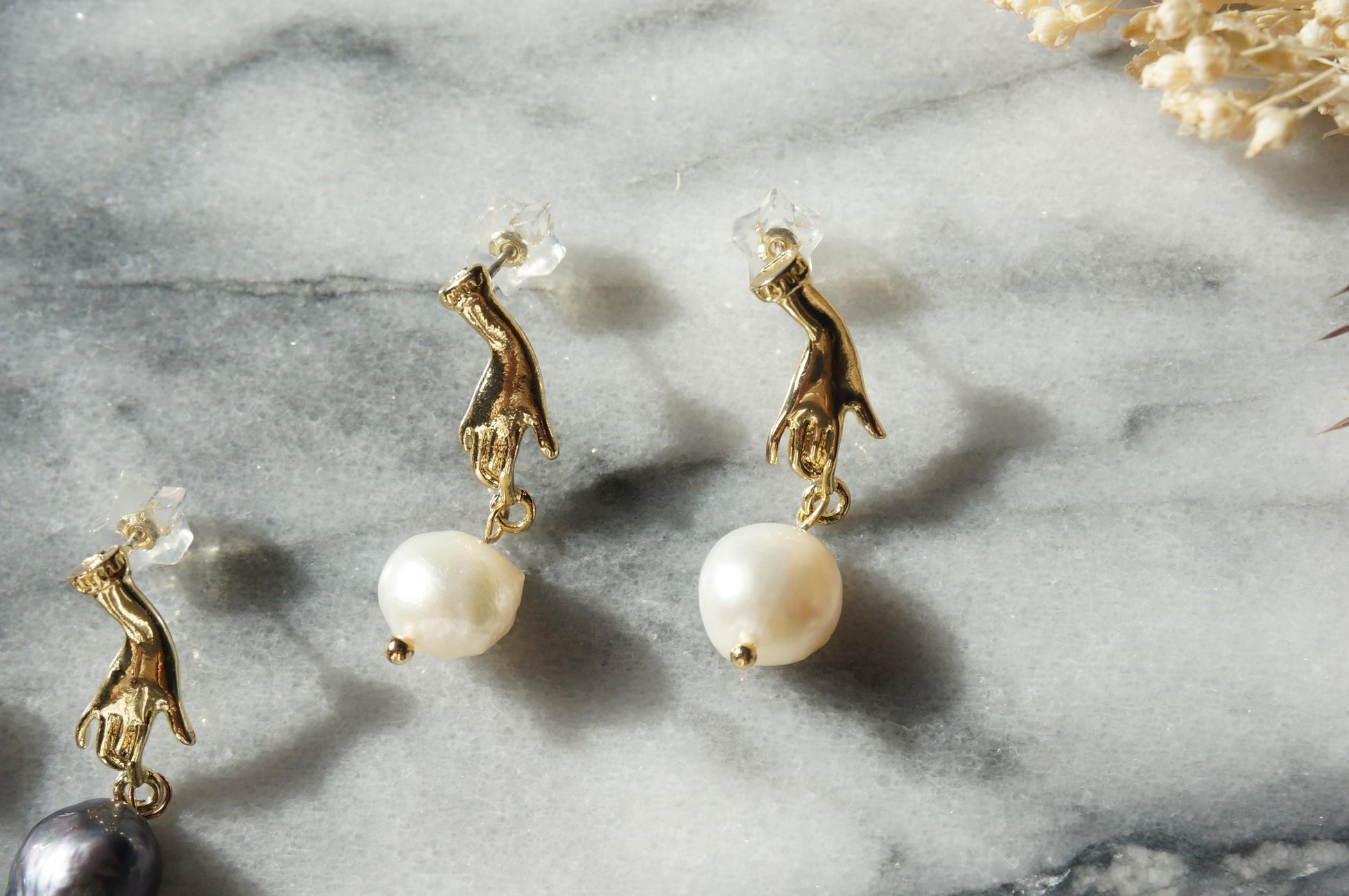 HAND HOLDING baroque Pearl 18k gold plated STUD earrings / white and black pearl earrings