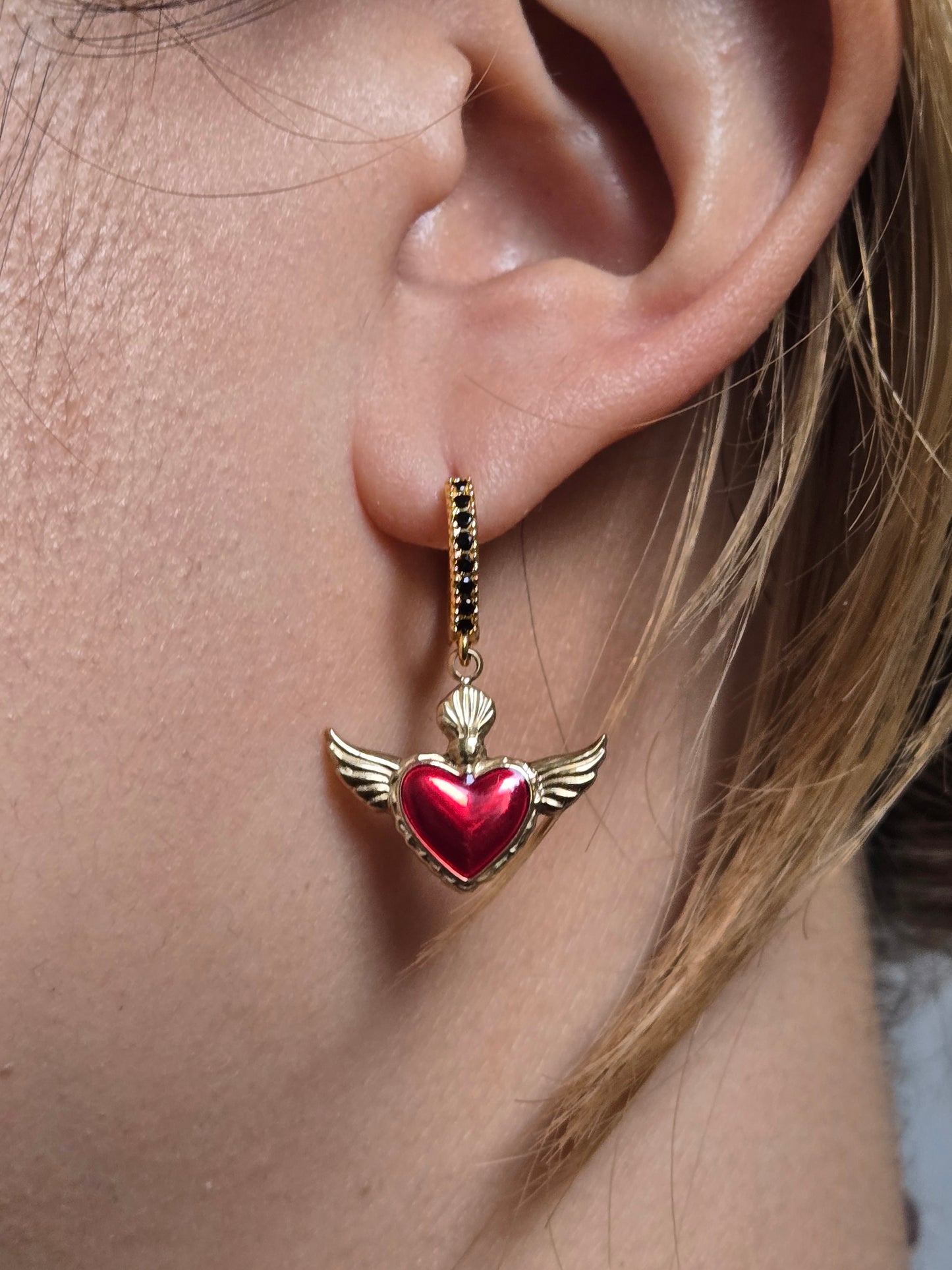 Winged sacred heart black studded hoops