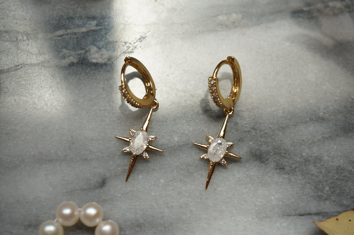 SELESTE North Star Opalite Huggie Hoop Earrings in Gold / Silver