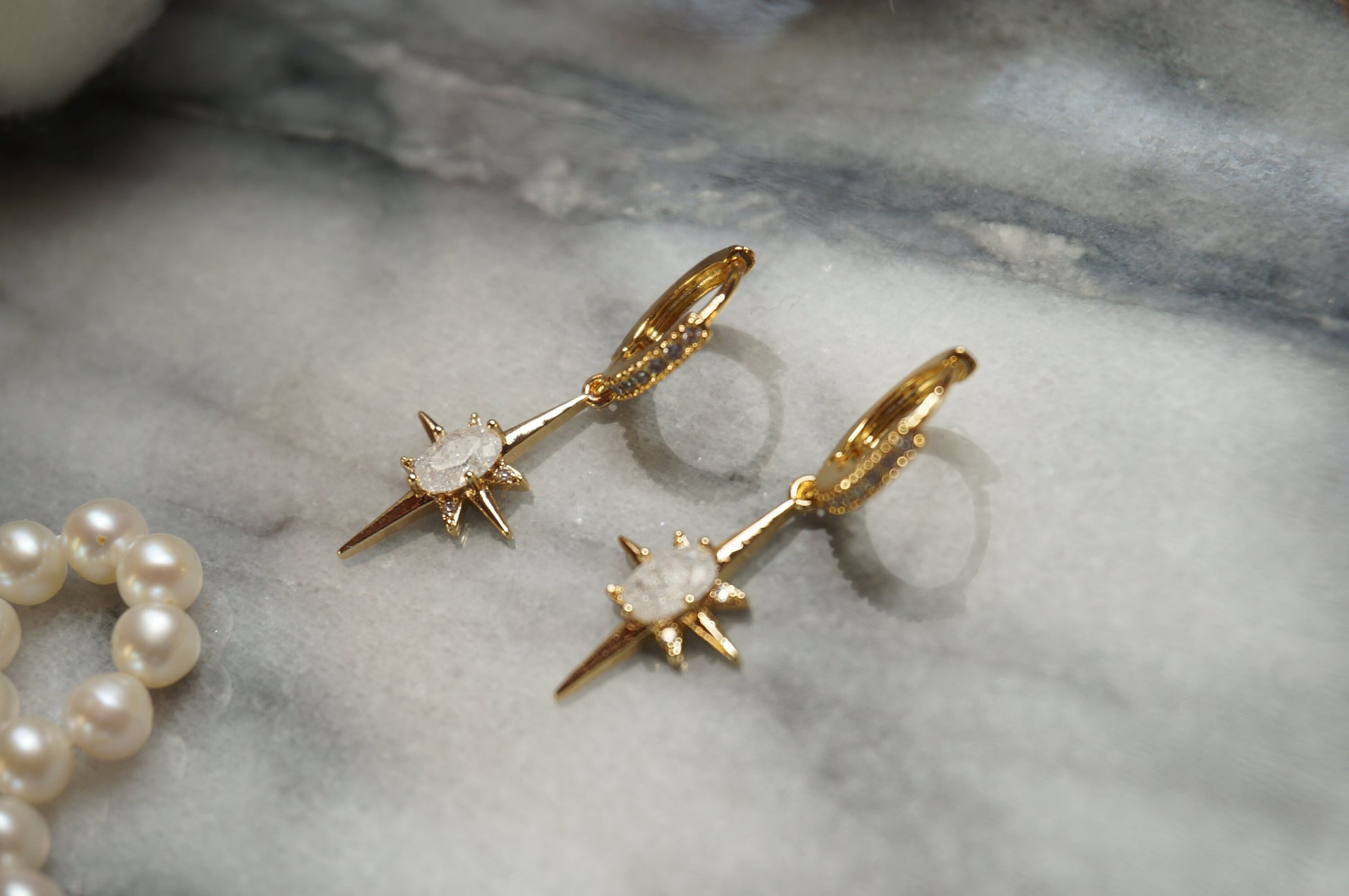 SELESTE North Star Opalite Huggie Hoop Earrings in Gold / Silver