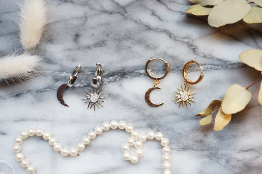 SOLSTICE Sun and Moon Mismatched Thick Gold Huggie Hoop Earrings in Gold/Silver