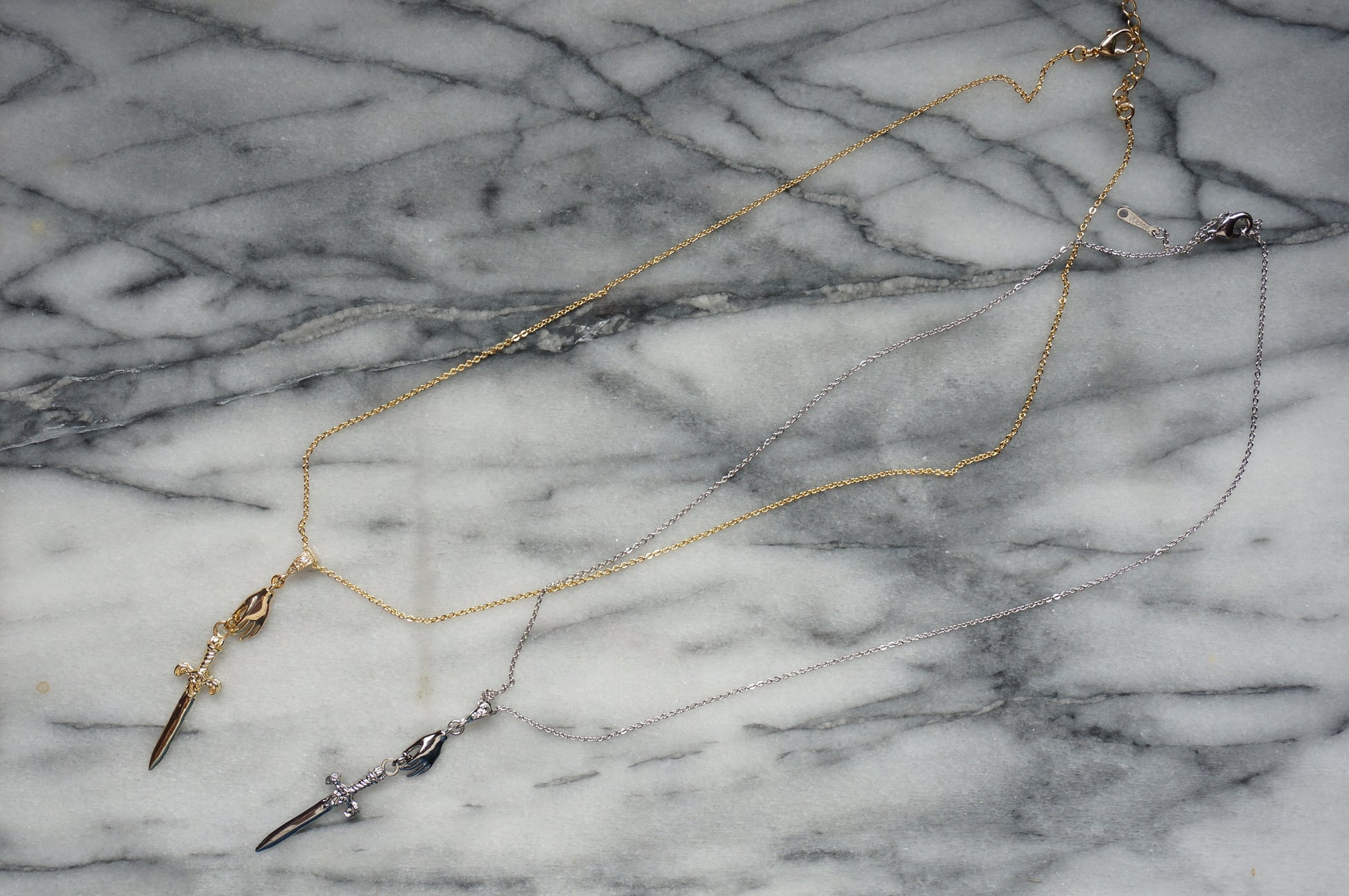 Gold/Silver Queen of Swords Tarot Necklace / Dagger Necklace / Tarot hand Dainty Necklace
