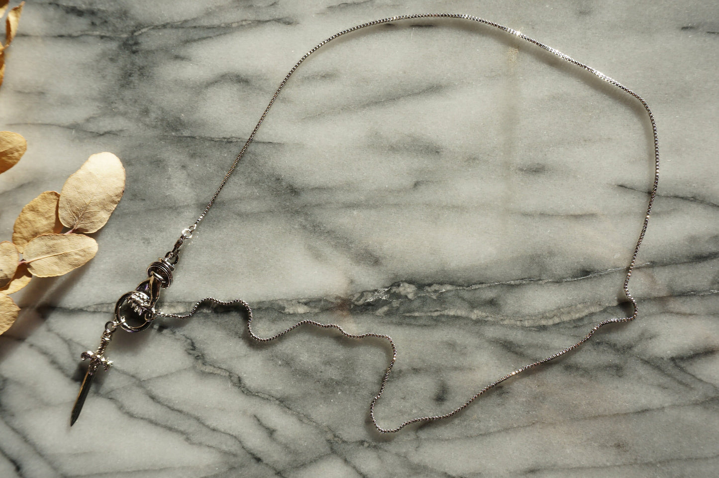 THE HAND Gold / Silver / Black hand and sword necklace / Gold / Silver / Black sword statement necklace