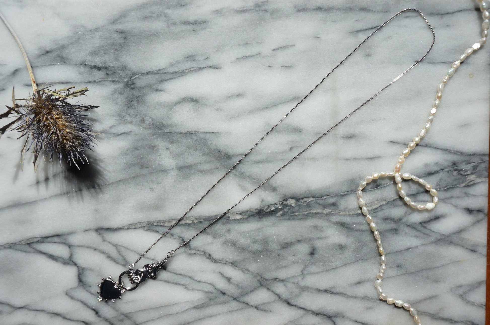 Hand holding Heart Gold / Silver Necklace