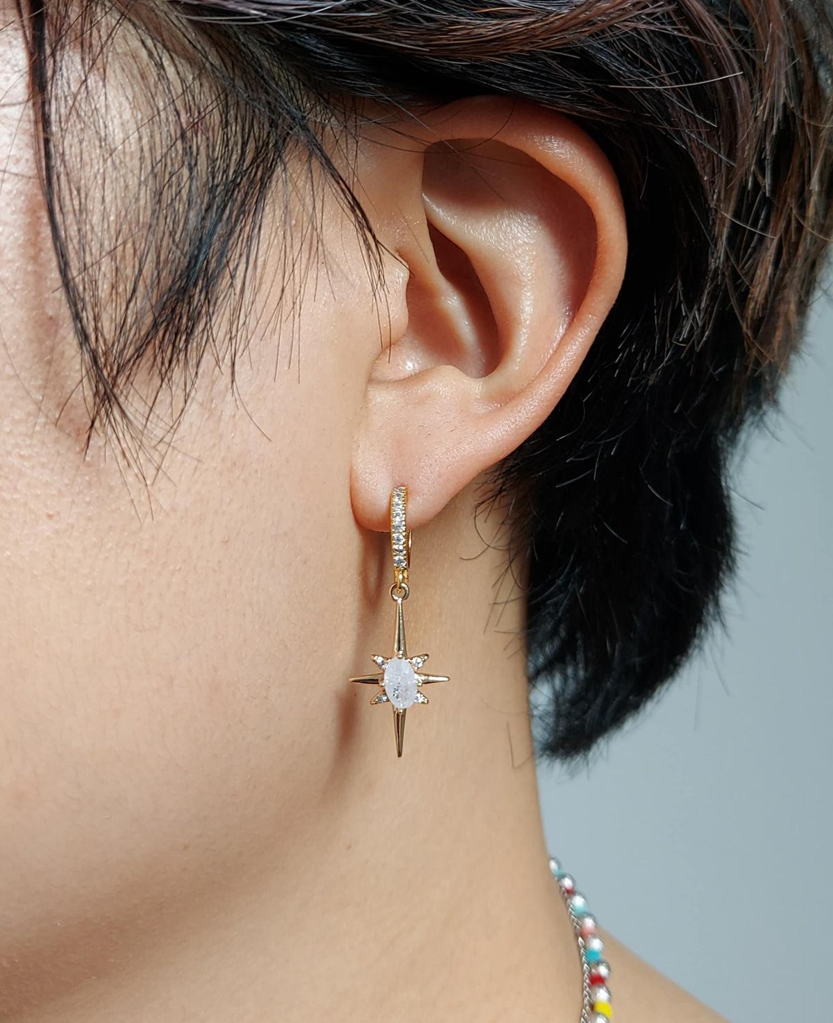SELESTE North Star Opalite Huggie Hoop Earrings in Gold / Silver
