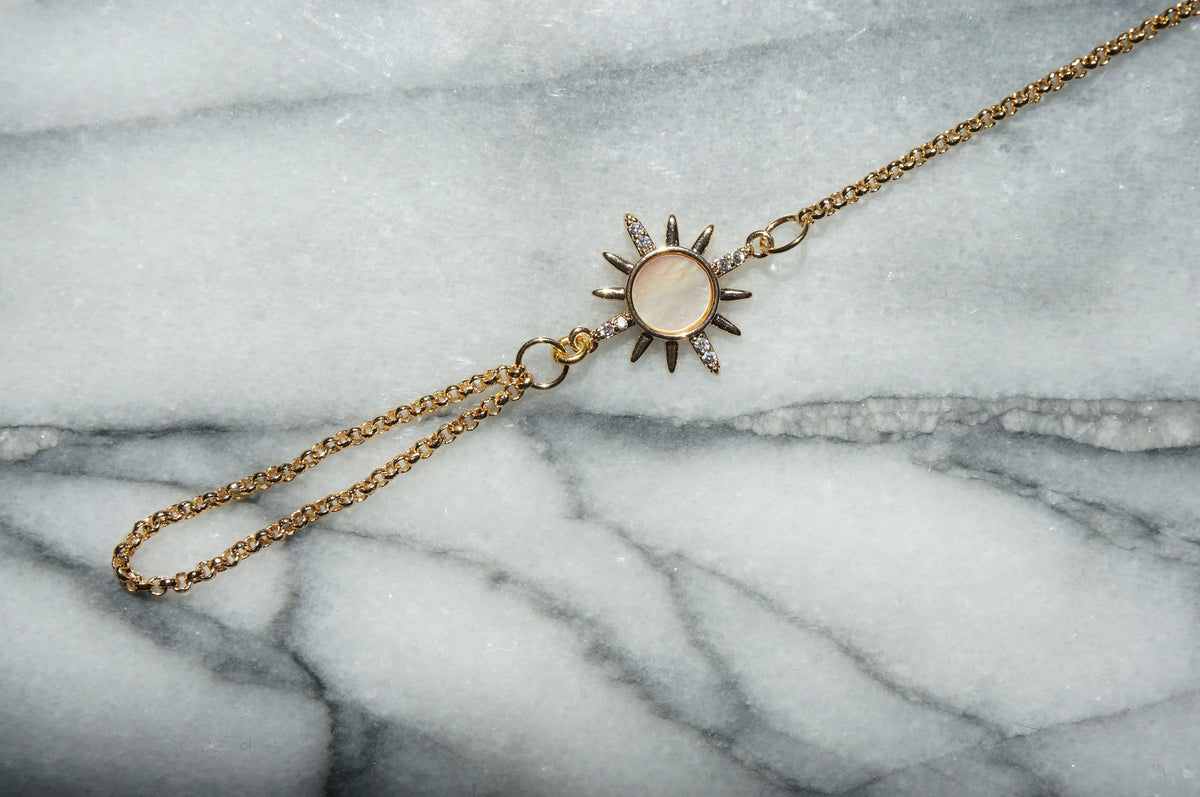 Gold Hand Chain Bracelet with Mother of Pearl Sun Charm