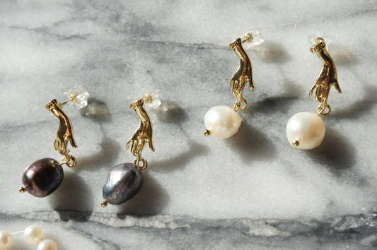 HAND HOLDING baroque Pearl 18k gold plated STUD earrings / white and black pearl earrings