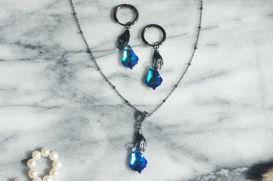 Azure HAND HOLDING blue crystal necklace and earrings
