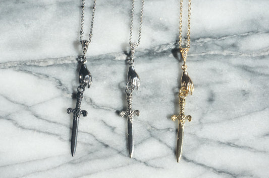 Gold/Silver Queen of Swords Tarot Necklace / Dagger Necklace / Tarot hand Dainty Necklace