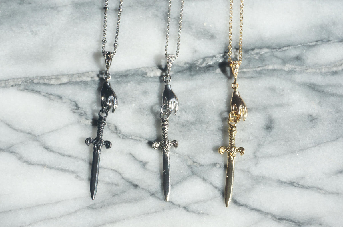 Gold/Silver Queen of Swords Tarot Necklace / Dagger Necklace / Tarot hand Dainty Necklace