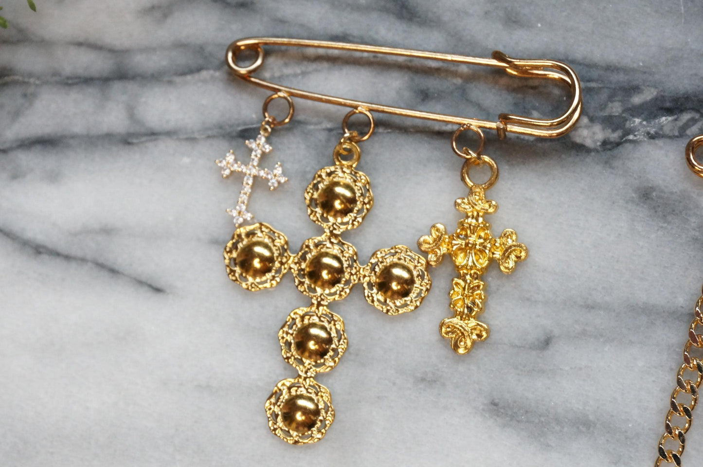 Oversized safety pin Lion / Sword / Cross