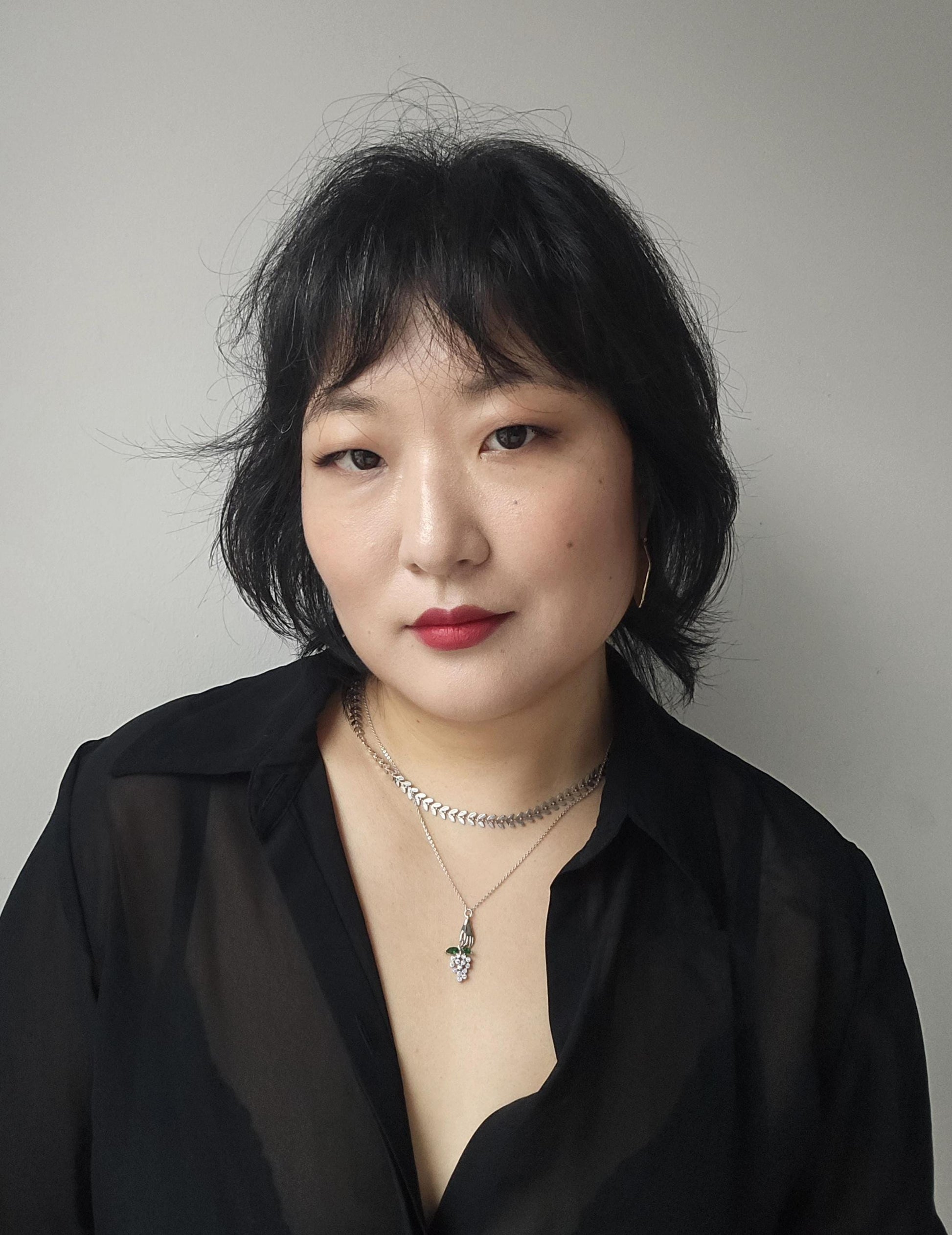 BACCHUS Hand Holding Grapes Necklace