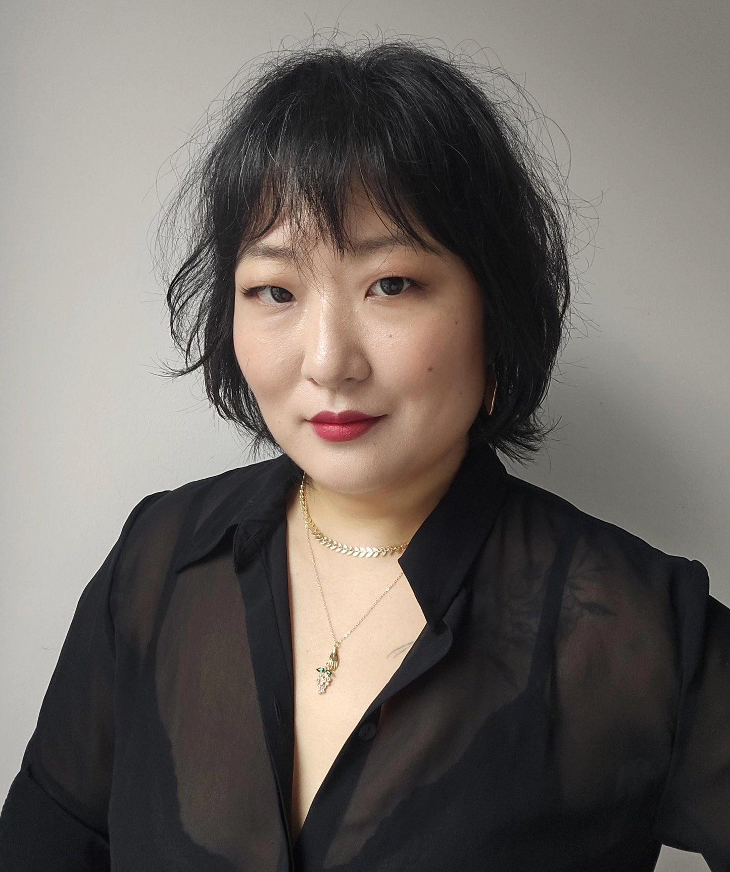 BACCHUS Hand Holding Grapes Necklace