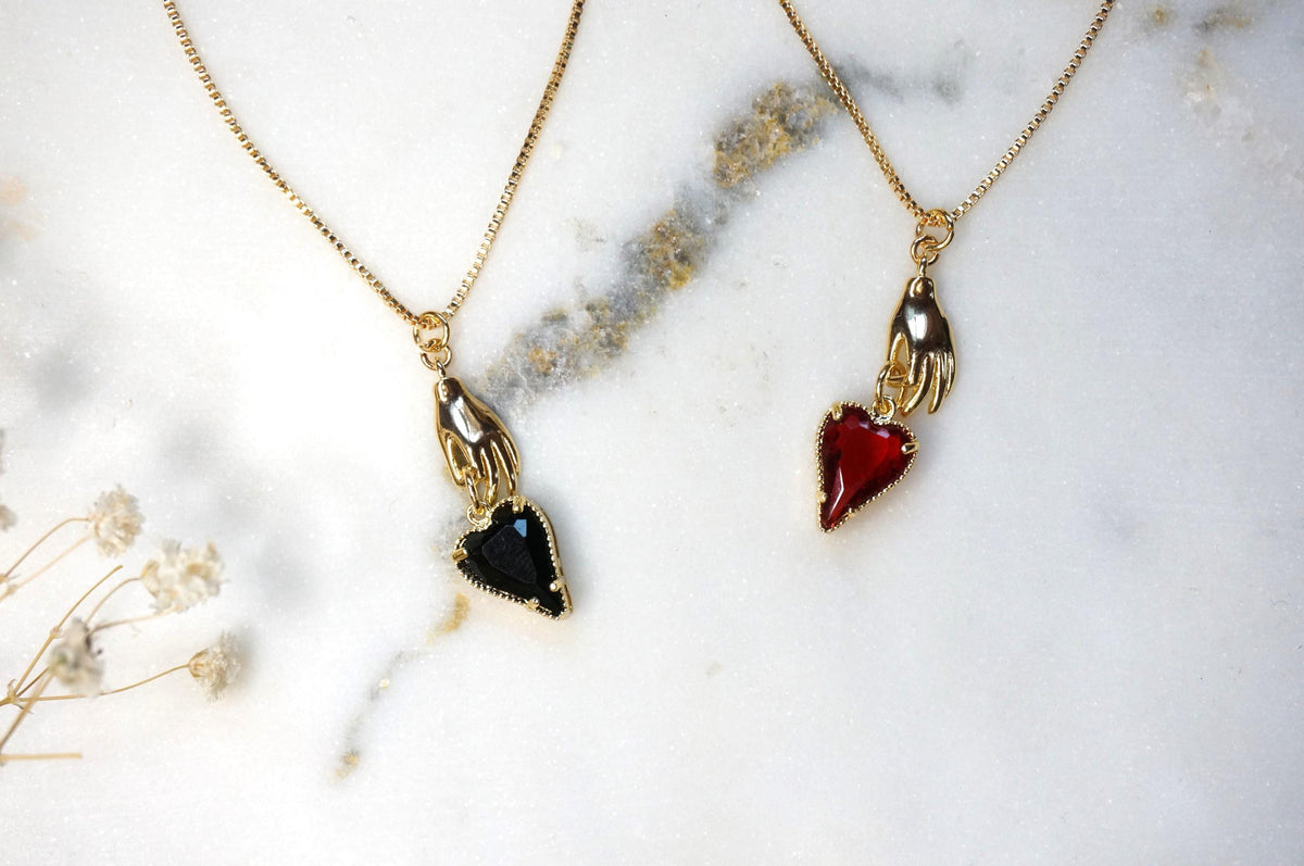 Alice Hand Holding Black/Red Heart Necklace