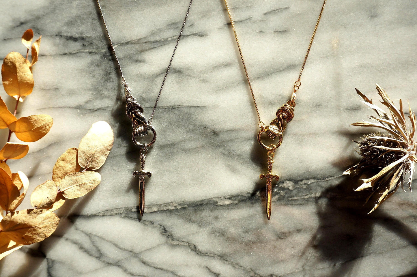 THE HAND Gold / Silver / Black hand and sword necklace / Gold / Silver / Black sword statement necklace