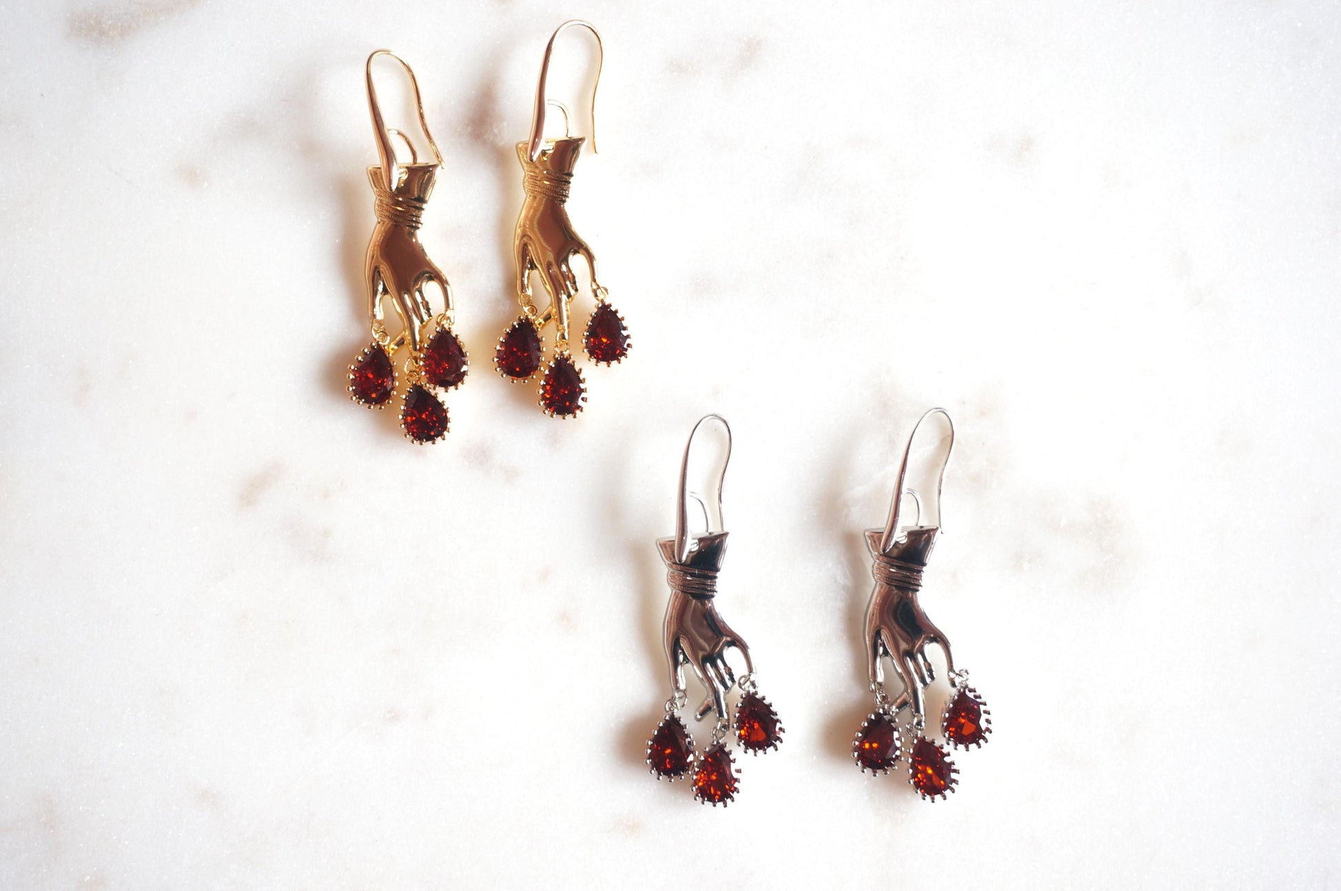 MACBETH Hand and Blooddrop earrings