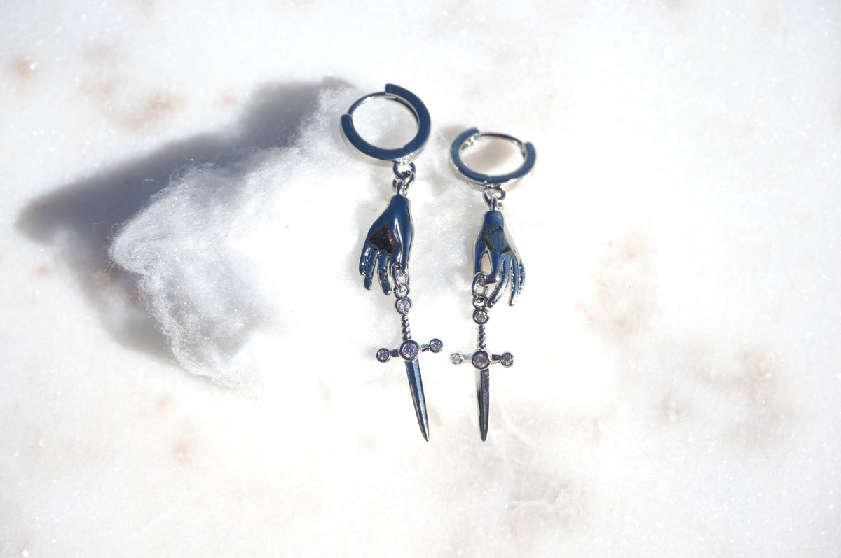 STILETTO Dainty Gold/Silver Hand Holding Dagger Huggie Hoop Earrings