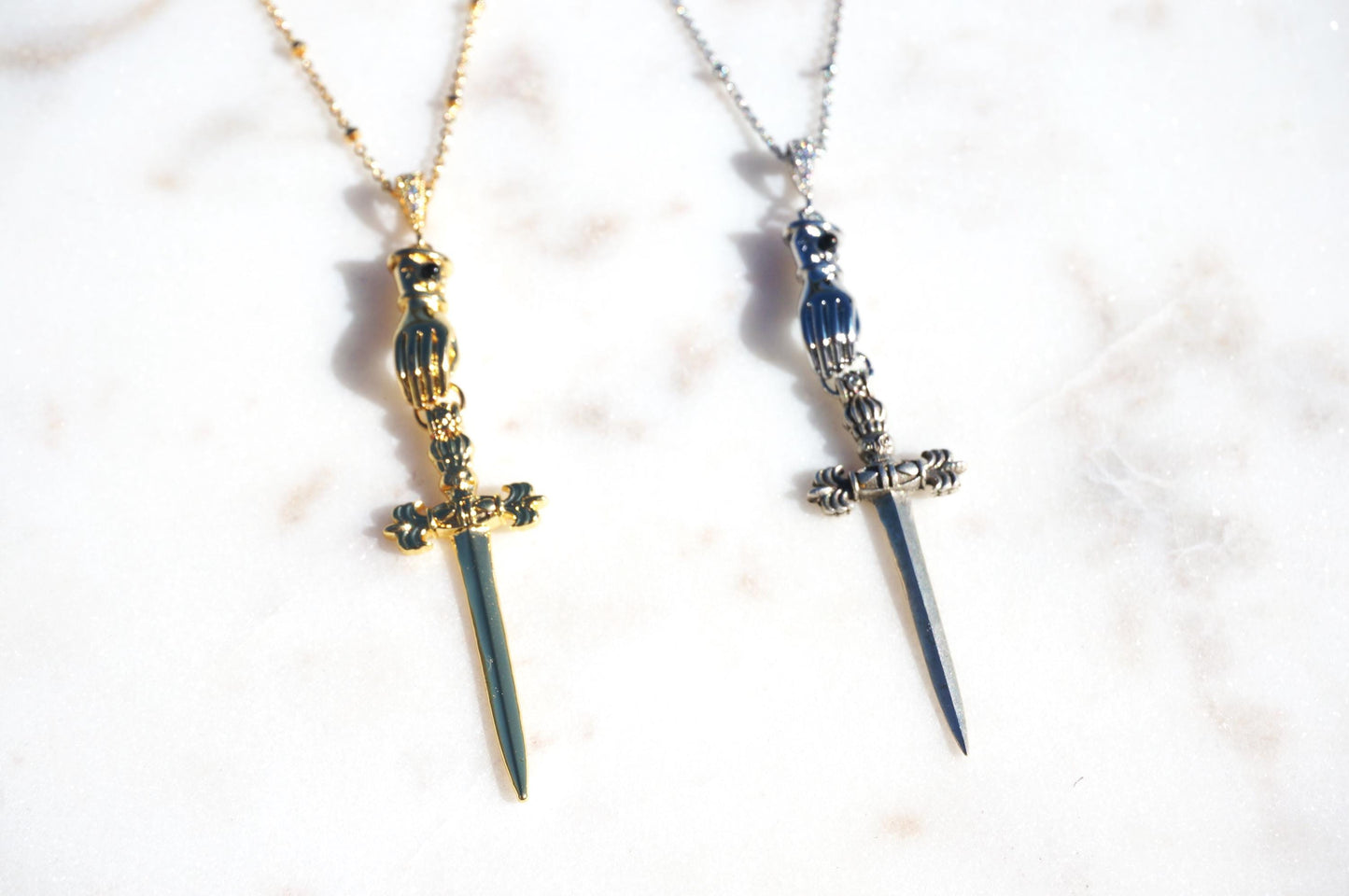 Gold/Silver Gauntlet Holding Gladius Sword Necklace