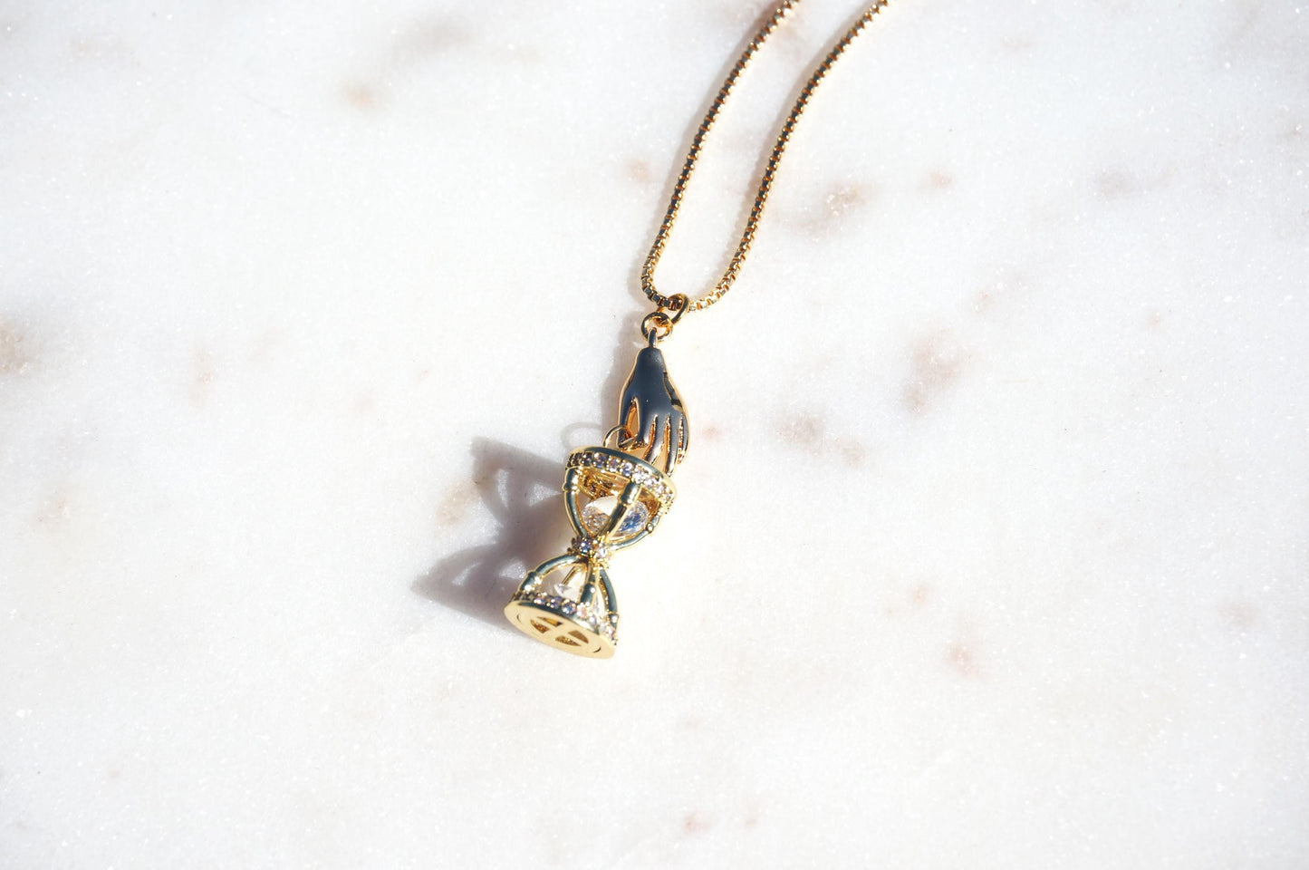 Gold/Silver Hand Holding Hourglass Necklace