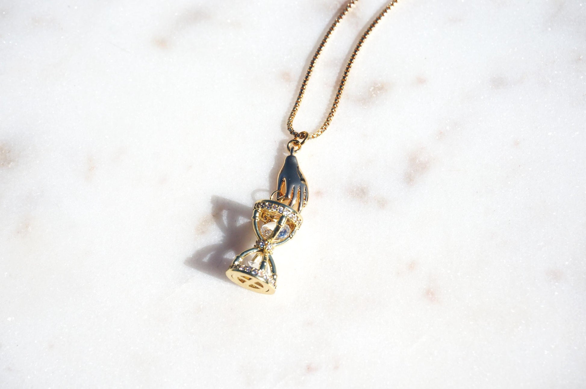 Gold/Silver Hand Holding Hourglass Necklace