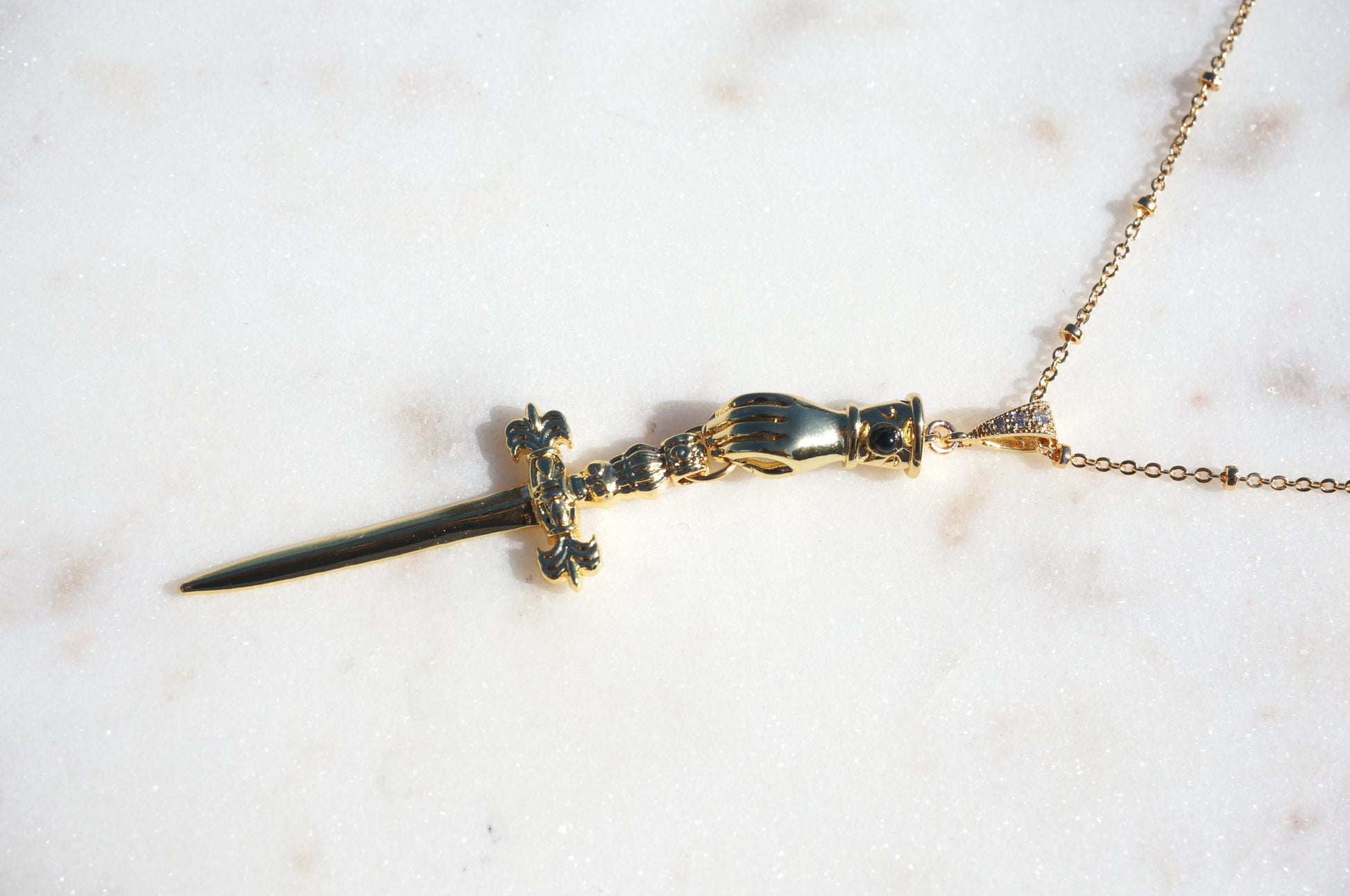 Gold/Silver Gauntlet Holding Gladius Sword Necklace