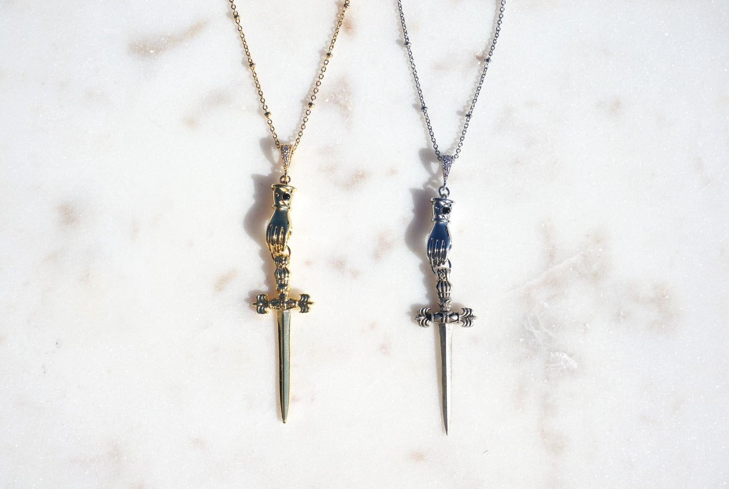 Gold/Silver Gauntlet Holding Gladius Sword Necklace