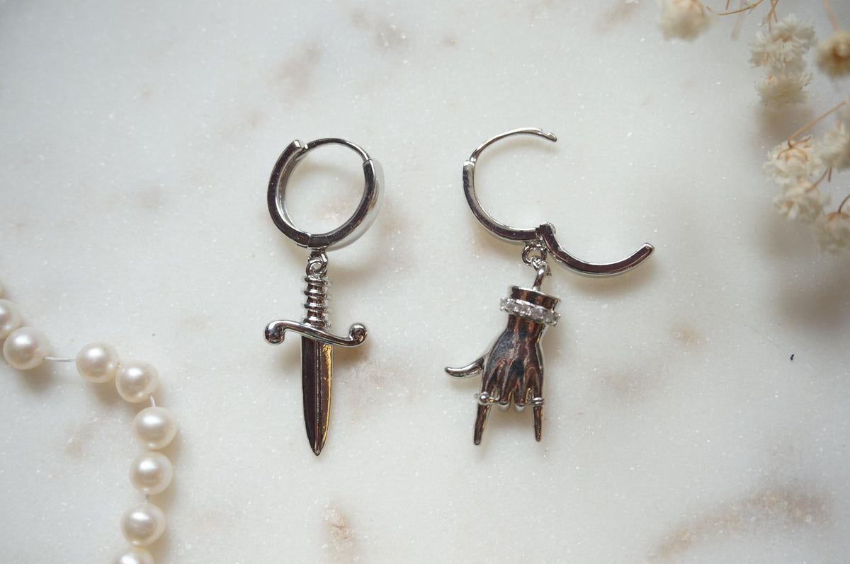 MELANGE Hand and Dagger Mismatched Hoop Earrings