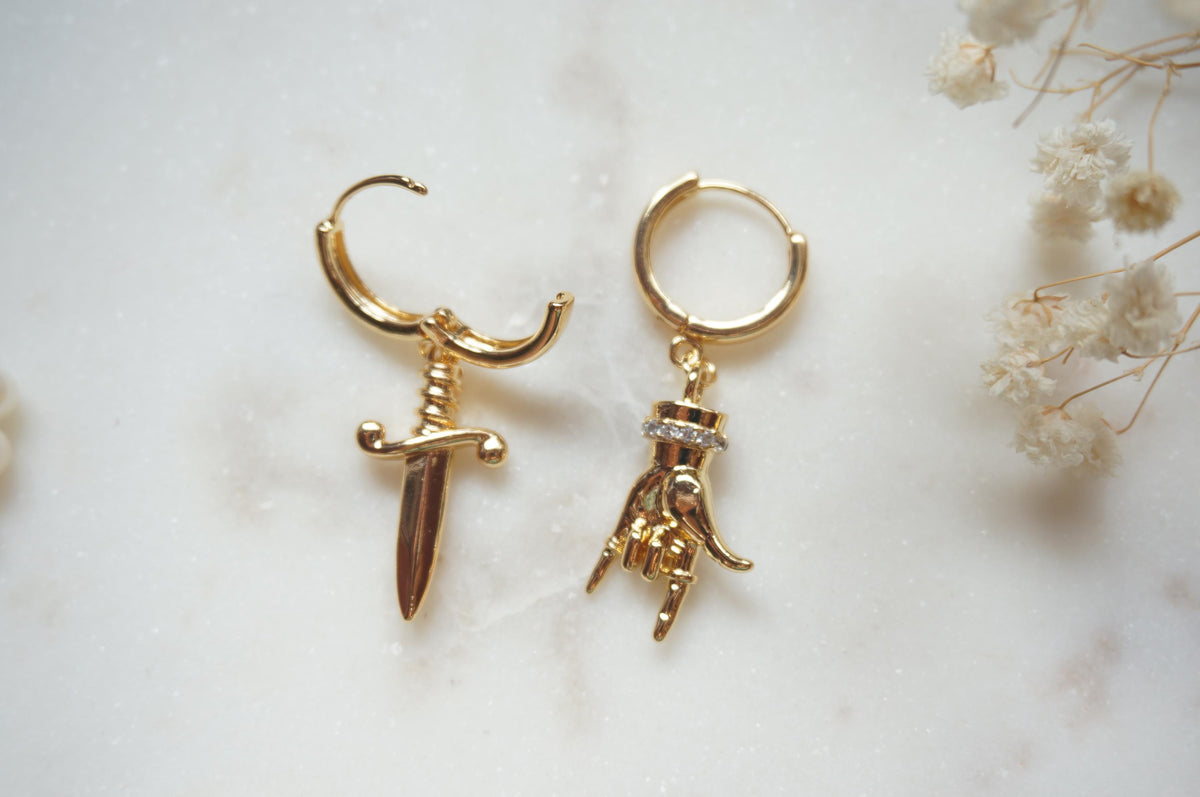 MELANGE Hand and Dagger Mismatched Hoop Earrings