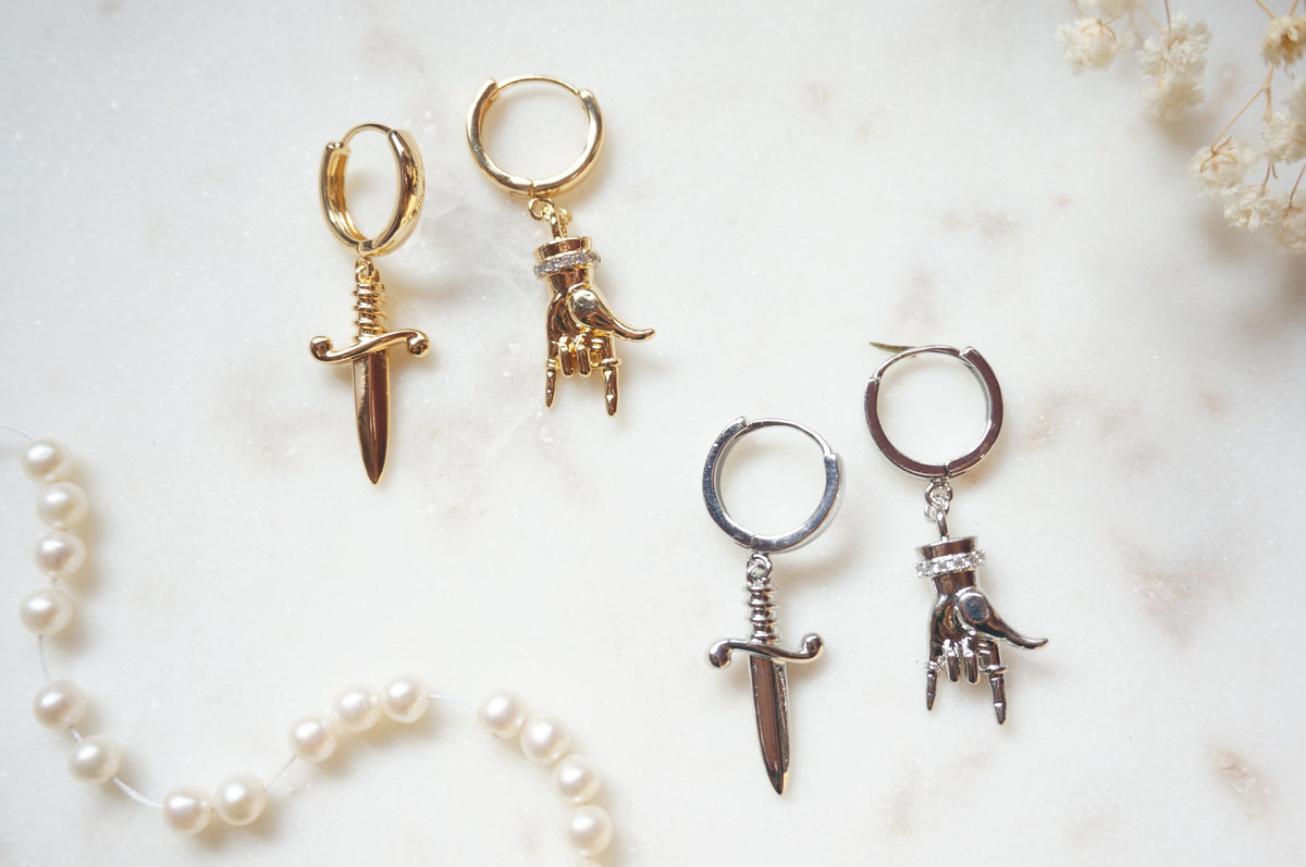 MELANGE Hand and Dagger Mismatched Hoop Earrings