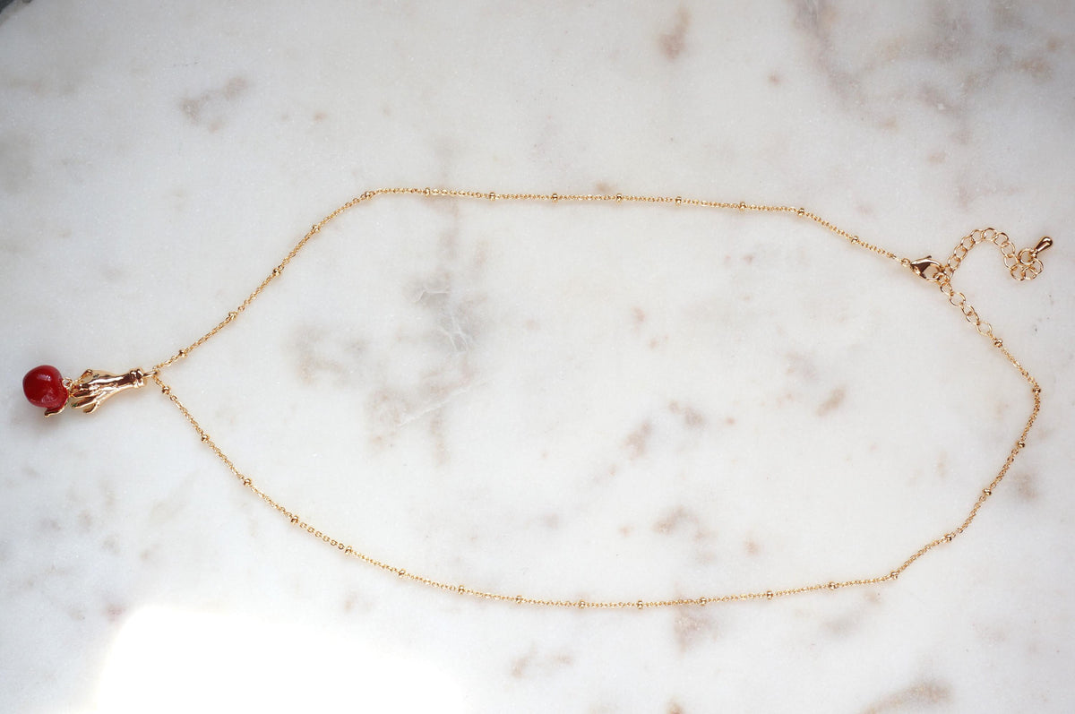 EVE Hand Holding Apple Necklace