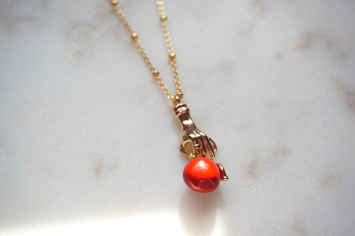 EVE Hand Holding Apple Necklace