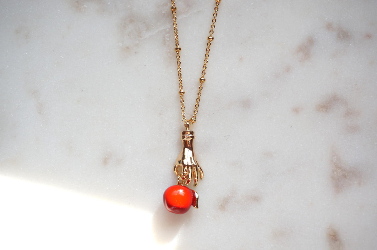 EVE Hand Holding Apple Necklace