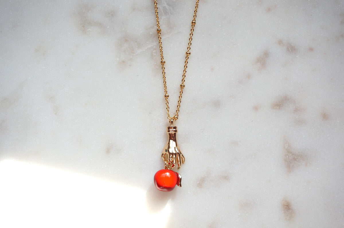 EVE Hand Holding Apple Necklace