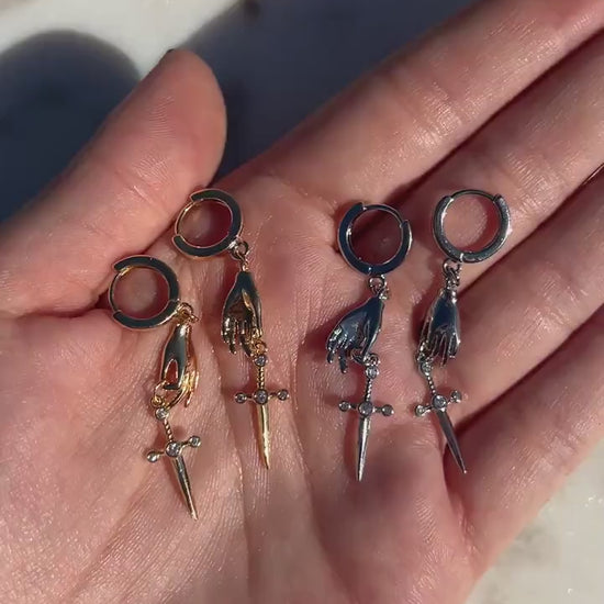STILETTO Dainty Gold/Silver Hand Holding Dagger Huggie Hoop Earrings