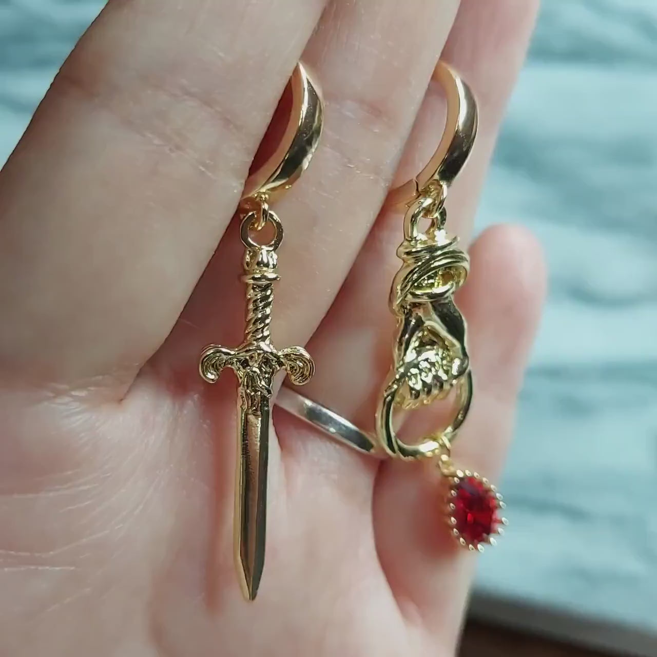 THE HAND Gold Sword and Teardrop Mismatched Huggie Earrings / Red Teardrop Earrings