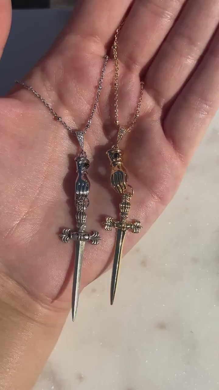 Gold/Silver Gauntlet Holding Gladius Sword Necklace