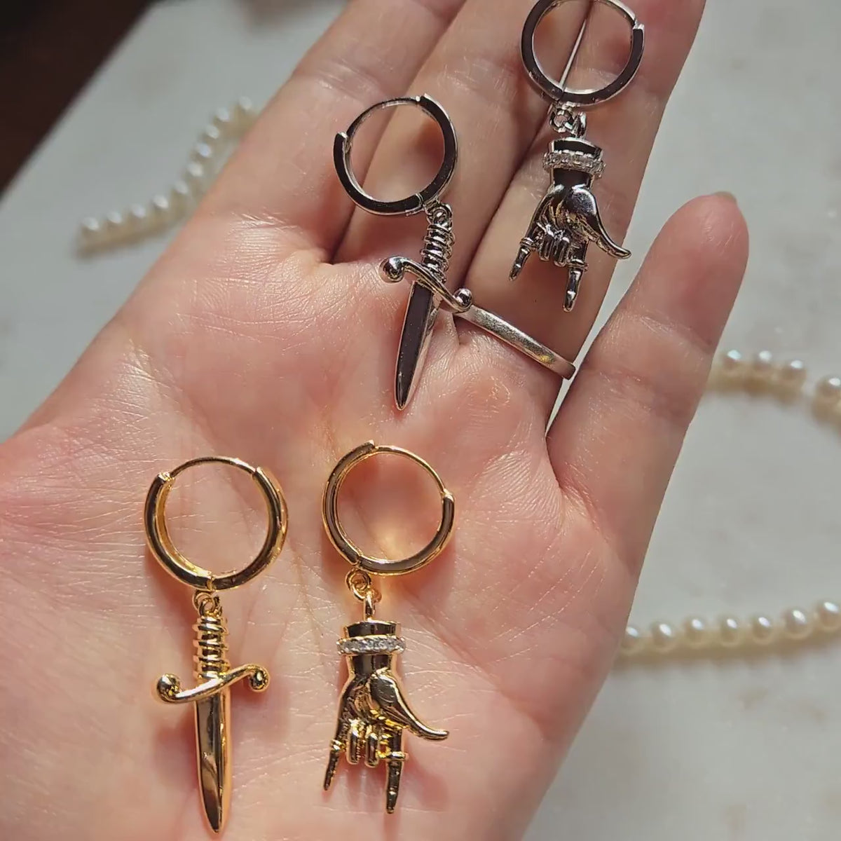 MELANGE Hand and Dagger Mismatched Hoop Earrings